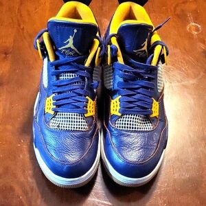Air jordan 4's navy and yellow